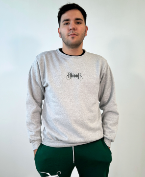 Sudadera de color gris con el logo de Ahinma en el pecho.